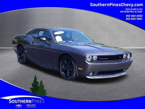 2013 Dodge Challenger for sale at PHIL SMITH AUTOMOTIVE GROUP - SOUTHERN PINES GM in Southern Pines NC