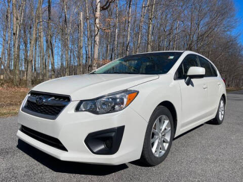 2014 Subaru Impreza for sale at GOOD USED CARS INC in Ravenna OH