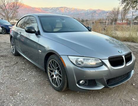 2012 BMW 3 Series for sale at The Car-Mart in Bountiful UT