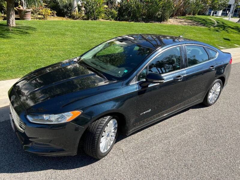 2014 Ford Fusion Hybrid for sale at GM Auto Group in Arleta CA