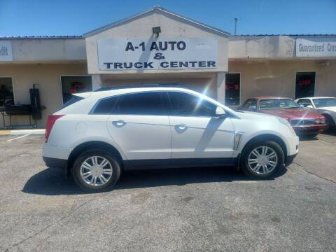 2013 Cadillac SRX for sale at A-1 AUTO AND TRUCK CENTER in Memphis TN