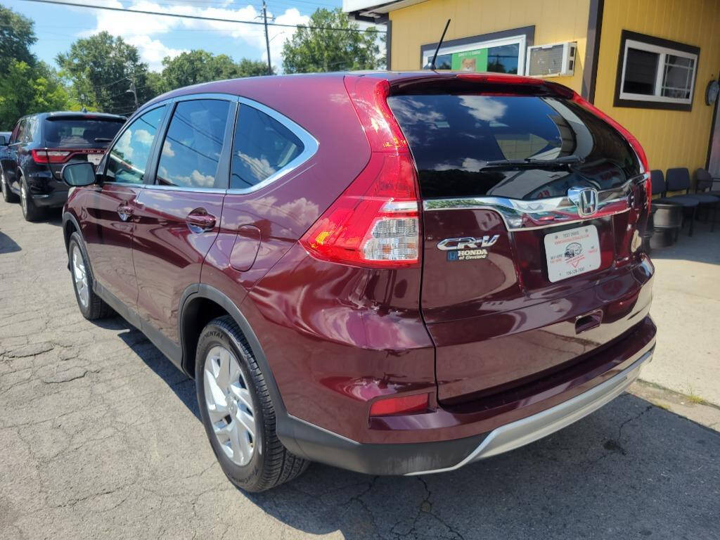 2016 Honda CR-V for sale at DAGO'S AUTO SALES LLC in Dalton, GA