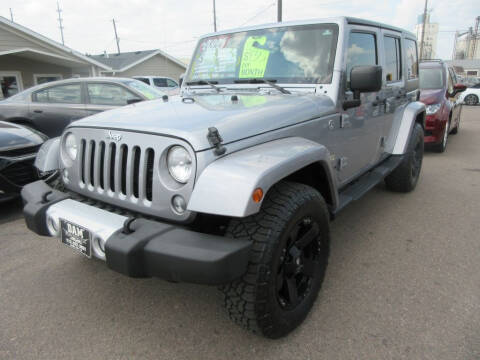2015 Jeep Wrangler Unlimited for sale at Dam Auto Sales in Sioux City IA
