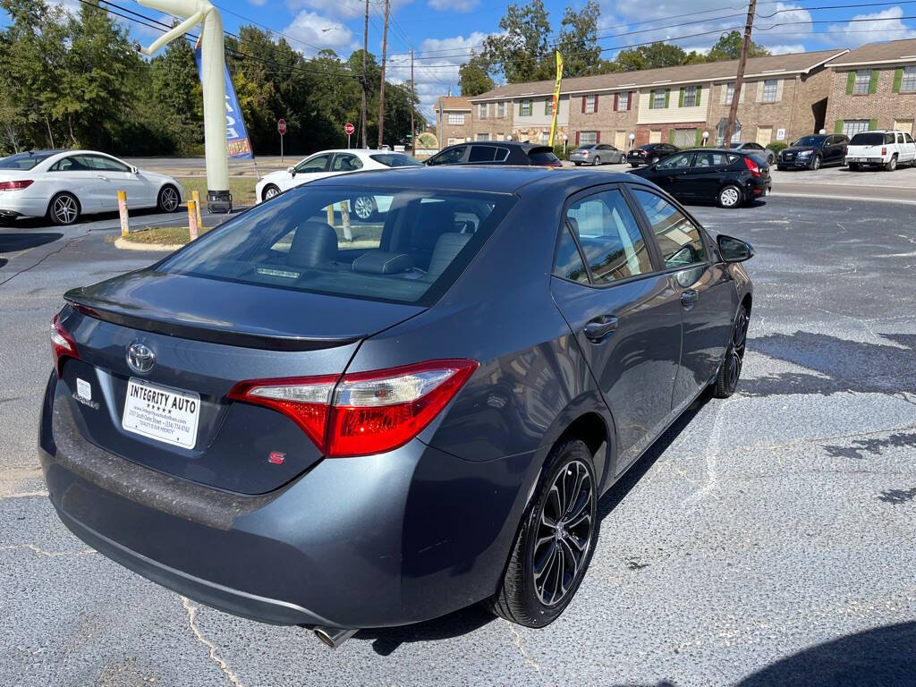 2014 Toyota Corolla for sale at INTEGRITY AUTO in Dothan, AL