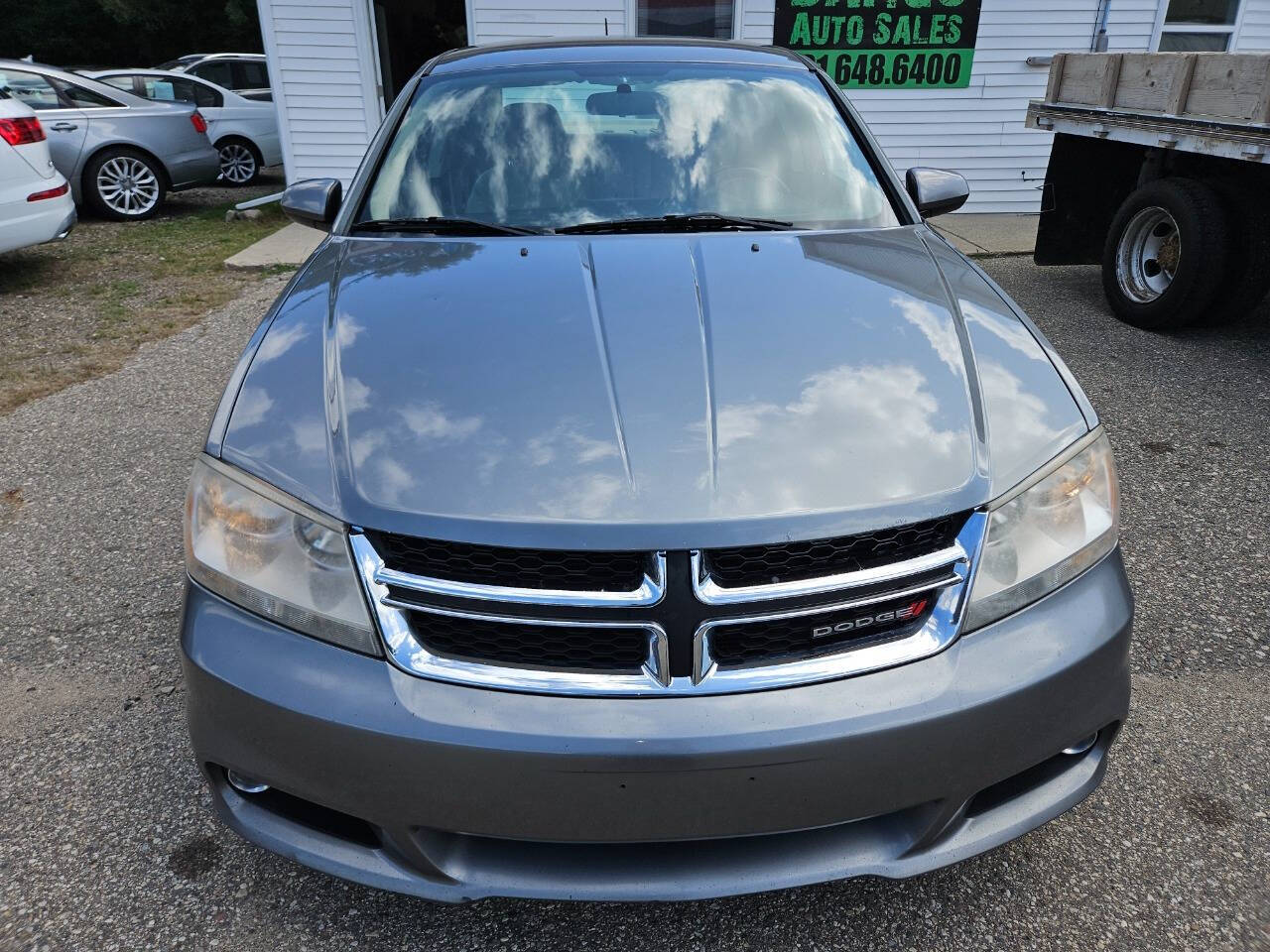 2013 Dodge Avenger for sale at DANGO AUTO SALES in HOWARD CITY, MI