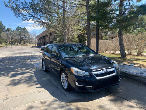 2013 Subaru Impreza for sale at QUEST MOTORS in Englewood CO