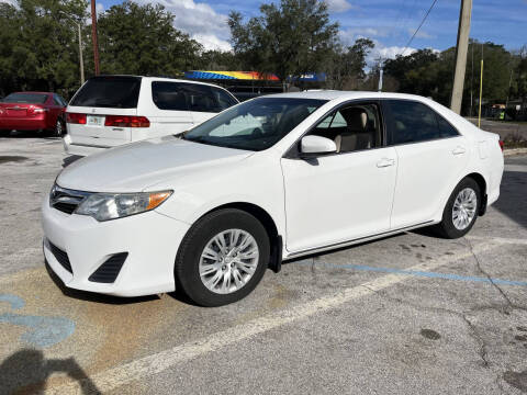 2013 Toyota Camry Hybrid for sale at Popular Imports Auto Sales in Gainesville FL