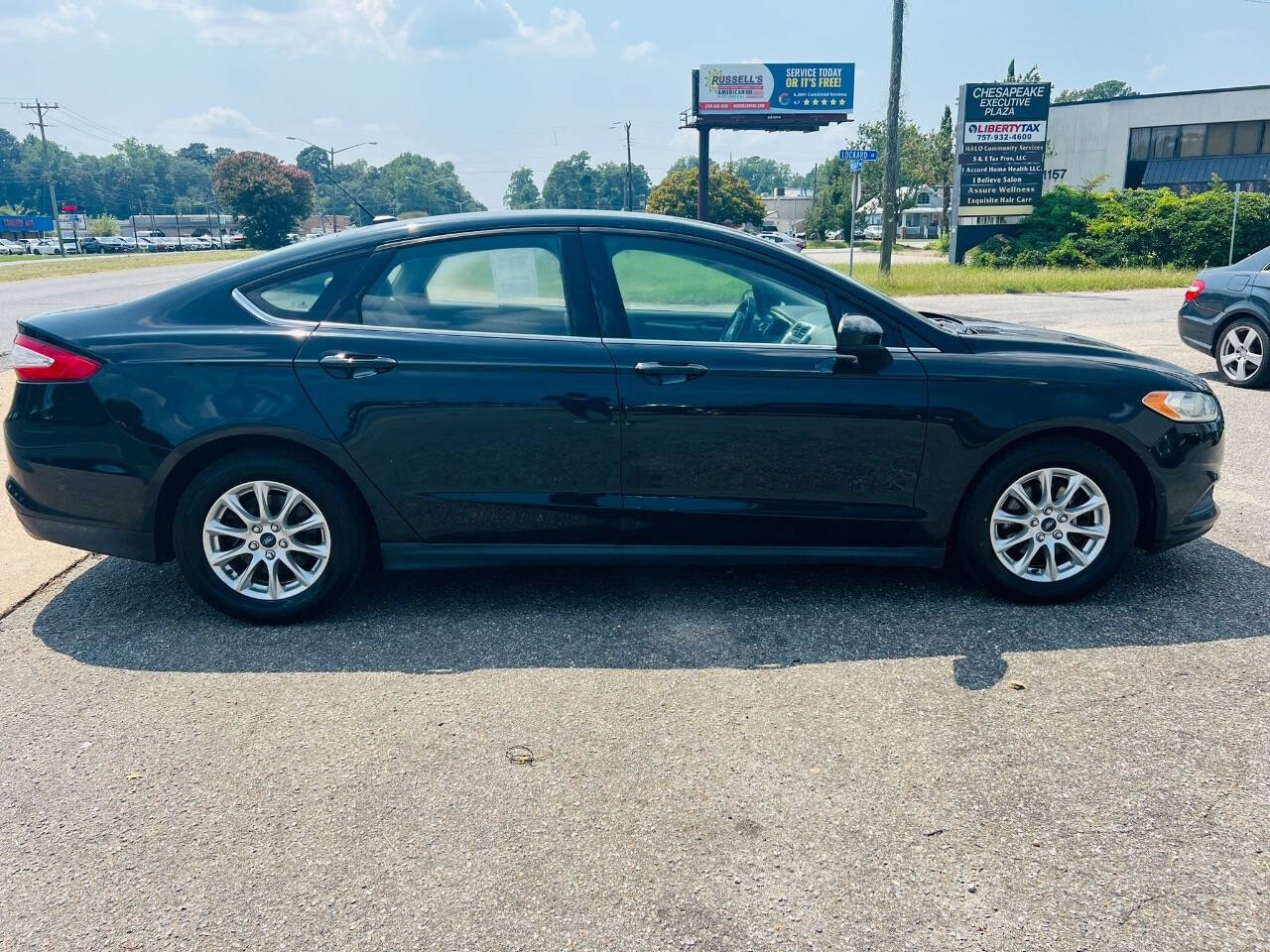 2014 Ford Fusion for sale at CAR FARMER & SALES in Chesapeake, VA