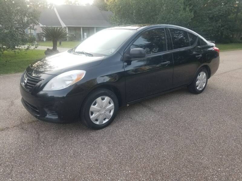 2014 Nissan Versa for sale at J & J Auto of St Tammany in Slidell LA
