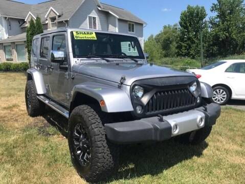 2015 Jeep Wrangler Unlimited for sale at FUSION AUTO SALES in Spencerport NY