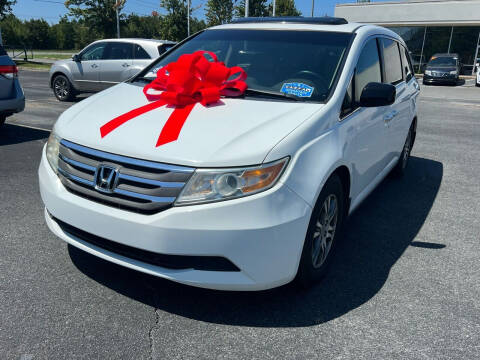 2012 Honda Odyssey for sale at Charlotte Auto Group, Inc in Monroe NC