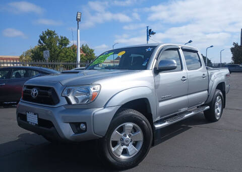2015 Toyota Tacoma for sale at Lugo Auto Group in Sacramento CA