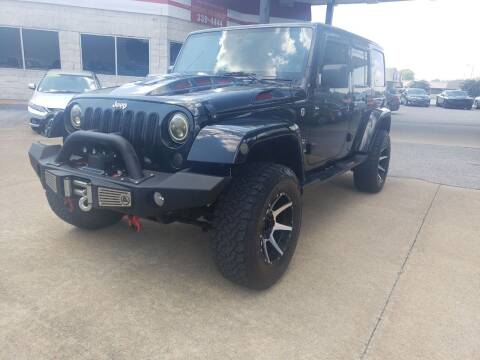 2013 Jeep Wrangler Unlimited for sale at Northwood Auto Sales in Northport AL
