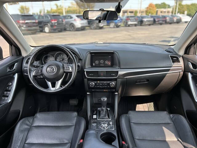 Used 2016 Mazda CX-5 Grand Touring with VIN JM3KE4DY4G0784685 for sale in Fenton, MI