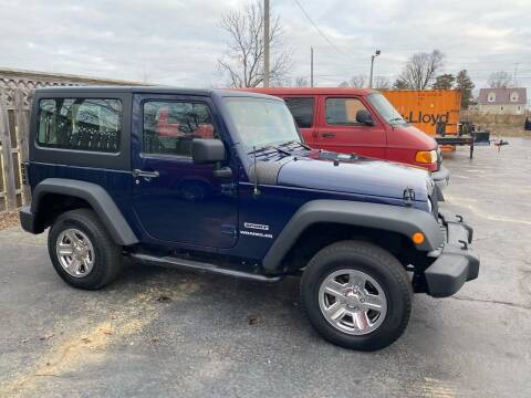 2013 Jeep Wrangler for sale at CarSmart Auto Group in Orleans IN