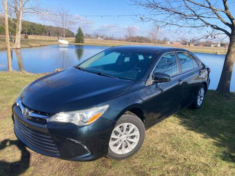 2015 Toyota Camry for sale at K2 Autos in Holland MI