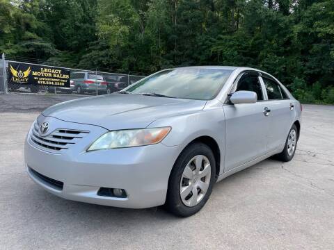 2009 Toyota Camry for sale at Legacy Motor Sales in Norcross GA