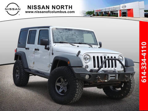 2016 Jeep Wrangler Unlimited for sale at Auto Center of Columbus in Columbus OH