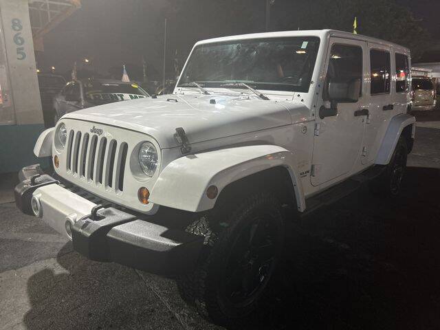 2011 Jeep Wrangler Unlimited for sale at VALDO AUTO SALES in Hialeah FL