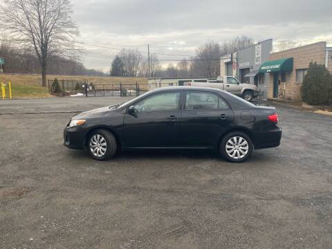 2012 Toyota Corolla for sale at 57 AUTO in Feeding Hills MA
