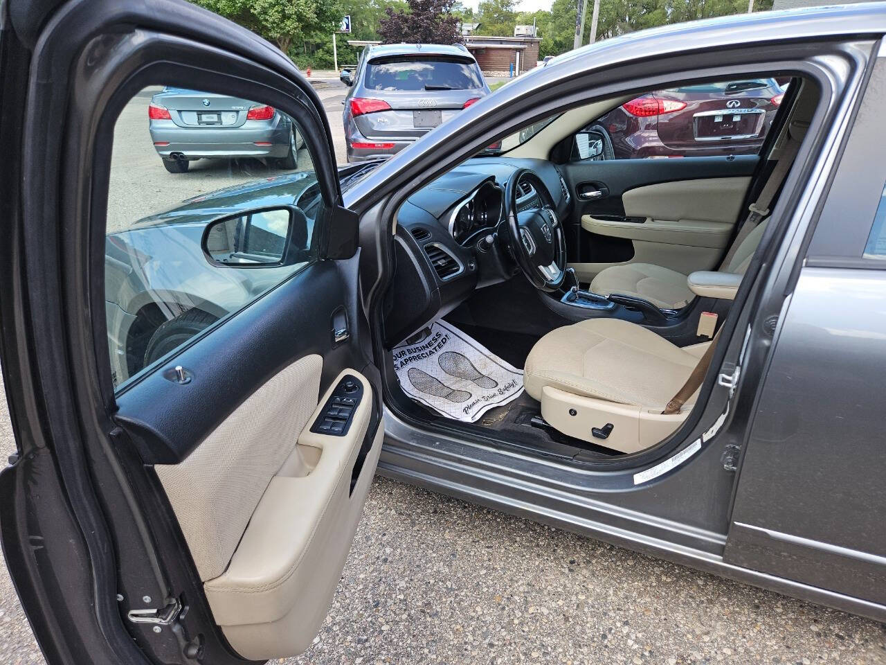 2013 Dodge Avenger for sale at DANGO AUTO SALES in HOWARD CITY, MI