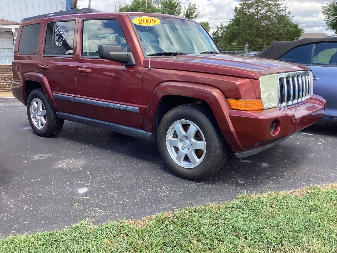 Red 2009 Jeep Commander Sport 4x4 Sport 4dr SUV 1