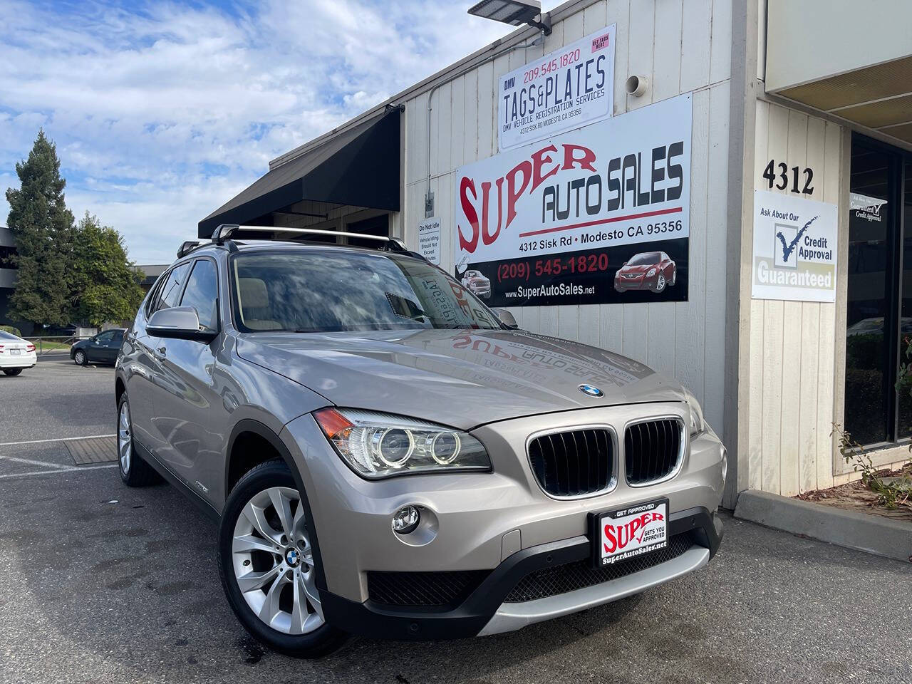 2014 BMW X1 for sale at Super Auto Sales Modesto in Modesto, CA