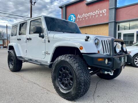 2012 Jeep Wrangler Unlimited for sale at Automotive Solutions in Louisville KY