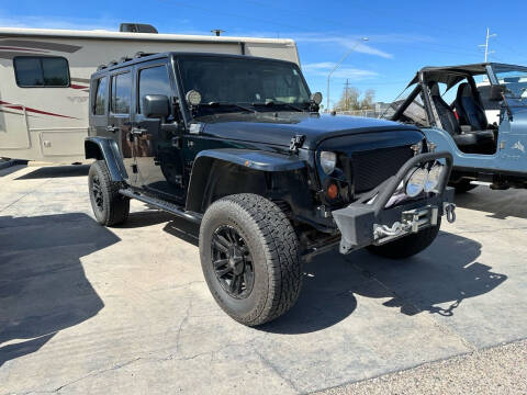 2010 Jeep Wrangler Unlimited for sale at TANQUE VERDE MOTORS in Tucson AZ
