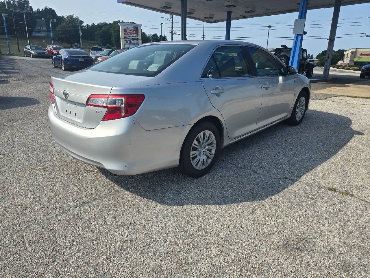 2012 Toyota Camry for sale at QUEENSGATE AUTO SALES in York, PA