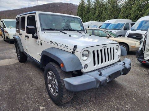 2014 Jeep Wrangler Unlimited for sale at Auto Direct Inc in Saddle Brook NJ