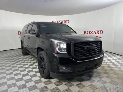 2020 GMC Yukon XL for sale at BOZARD FORD in Saint Augustine FL