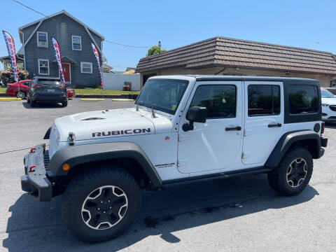 2015 Jeep Wrangler Unlimited for sale at MAGNUM MOTORS in Reedsville PA