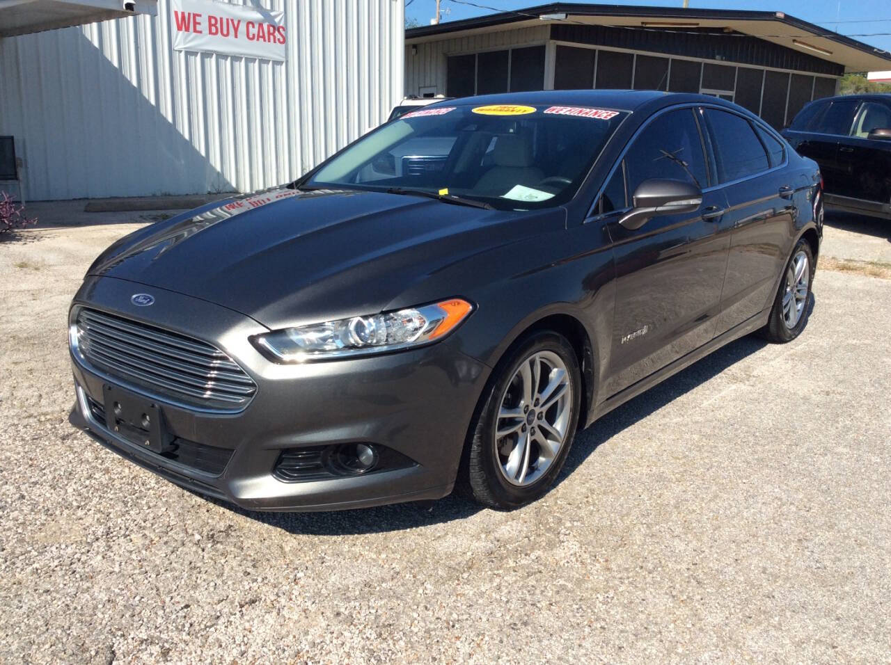 2015 Ford Fusion Hybrid for sale at SPRINGTIME MOTORS in Huntsville, TX