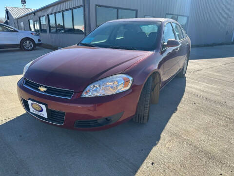 2006 Chevrolet Impala for sale at BERG AUTO MALL & TRUCKING INC in Beresford SD