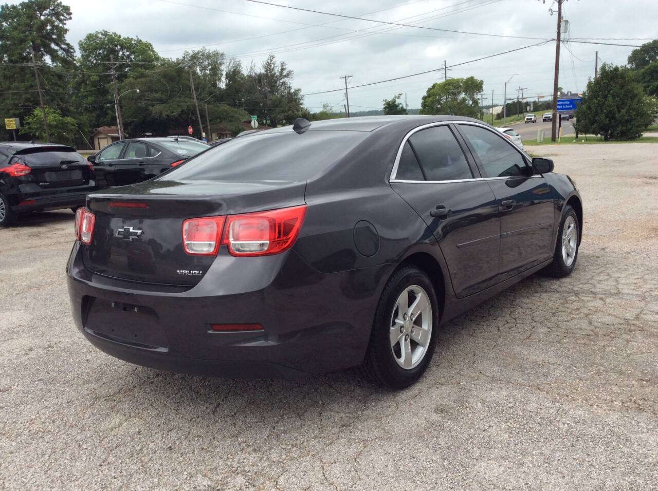 2013 Chevrolet Malibu for sale at SPRINGTIME MOTORS in Huntsville, TX