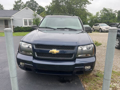 2009 Chevrolet TrailBlazer for sale at HEDGES USED CARS in Carleton MI