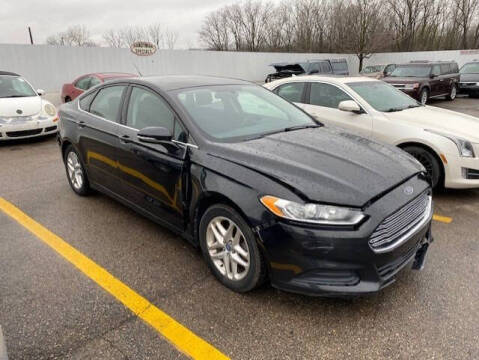 2013 Ford Fusion for sale at WELLER BUDGET LOT in Grand Rapids MI