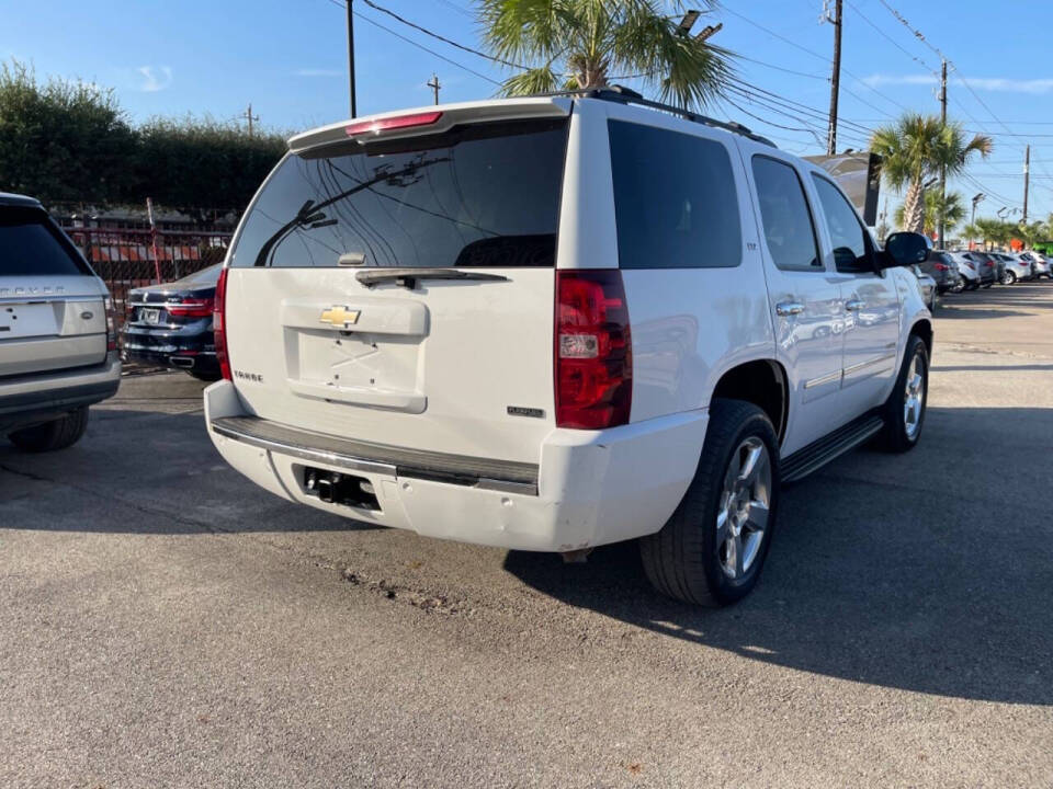 2011 Chevrolet Tahoe for sale at SMART CHOICE AUTO in Pasadena, TX