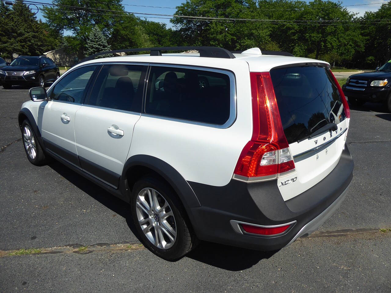 2016 Volvo XC70 for sale at Lakeshore Autos in Holland, MI