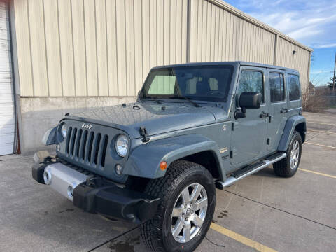 2015 Jeep Wrangler Unlimited for sale at Mr. Auto in Hamilton OH