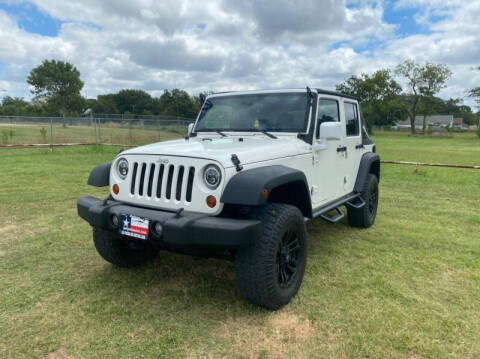 2010 Jeep Wrangler Unlimited for sale at LA PULGA DE AUTOS in Dallas TX