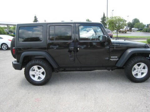 2017 Jeep Wrangler Unlimited for sale at FINNEY'S AUTO & TRUCK in Atlanta IN