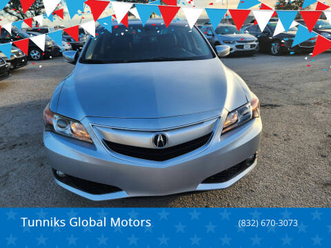 2013 Acura ILX for sale at Tunniks Global Motors in Houston TX