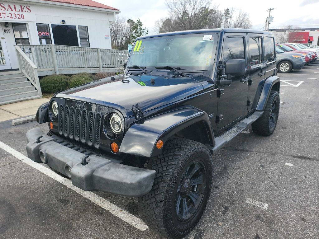 2011 Jeep Wrangler Unlimited for sale at First Place Auto Sales LLC in Rock Hill, SC