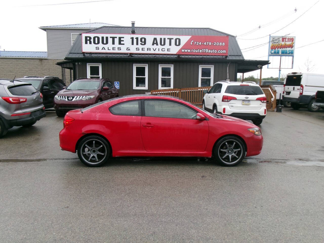 Red 2005 Scion tC Base 2dr Hatchback 1