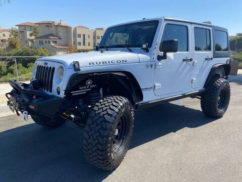 2015 Jeep Wrangler Unlimited for sale at CALIFORNIA AUTO GROUP in San Diego CA