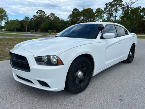 2012 Dodge Charger for sale at LLAPI MOTORS in Hudson FL