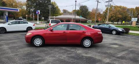 2007 Toyota Camry for sale at VINE STREET MOTOR CO in Urbana IL