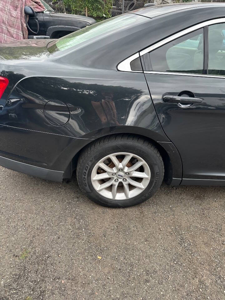 2013 Ford Taurus for sale at 77 Auto Mall in Newark, NJ